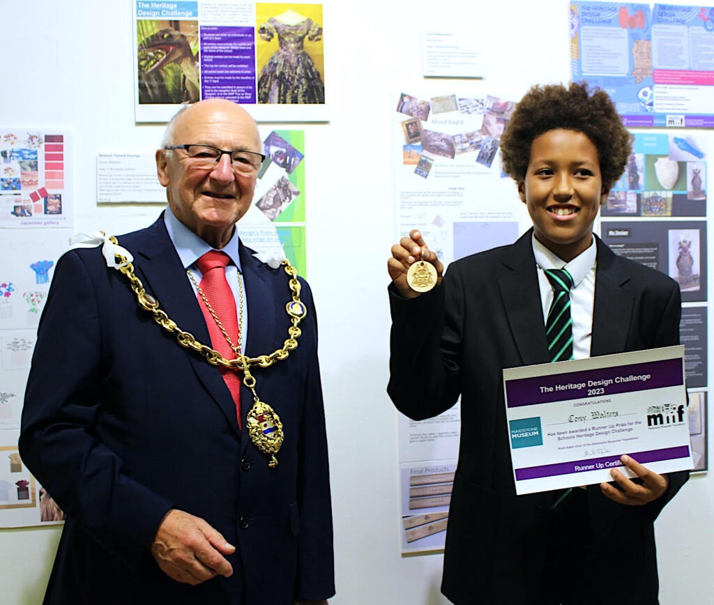 MMF Heritage Design Awards 2023 Runner Up - Corey Walters shows off his key ring to the Mayor of Maidstone
