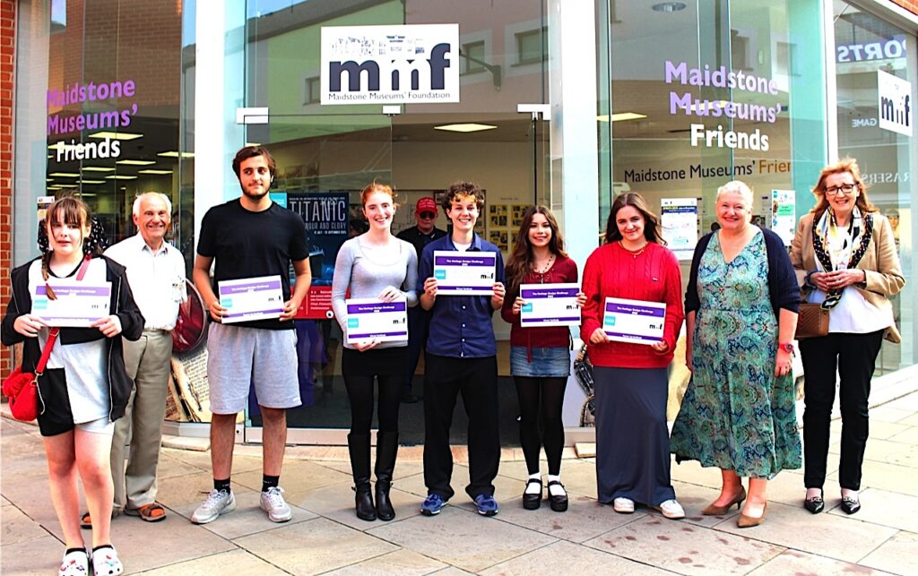 MMF Heritage Awards. Success: students from Meadowfield School Sittingbourne, and Queen Elizabeth's Grammar School, Faversham, with MMF President Victoria Wallace (second right), Janette Lloyd, Challenge organiser (right), and Ivan White, MMF trustee and Challenge co-ordinator